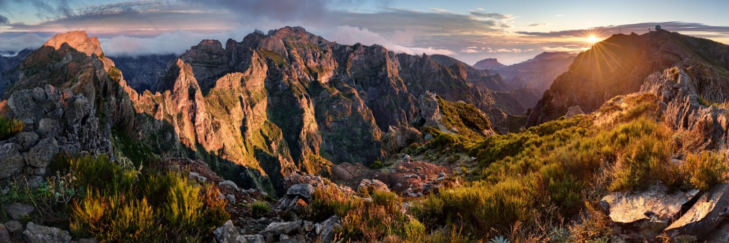 Mountain landscpape panorama at sunrise over clouds in Madeira Island, Pico Arieiro, Portugal